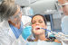 Dental check woman patient dentist team, фото № 6135817, снято 22 июня 2014 г. (c) CandyBox Images / Фотобанк Лори