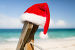 close up of santa helper hat on beach, фото № 6141426, снято 12 февраля 2014 г. (c) Syda Productions / Фотобанк Лори