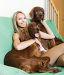 Girl with two Irish setters at home, фото № 6228502, снято 8 июля 2014 г. (c) Яков Филимонов / Фотобанк Лори