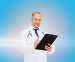 smiling male doctor with clipboard and stethoscope, фото № 6258760, снято 10 мая 2014 г. (c) Syda Productions / Фотобанк Лори