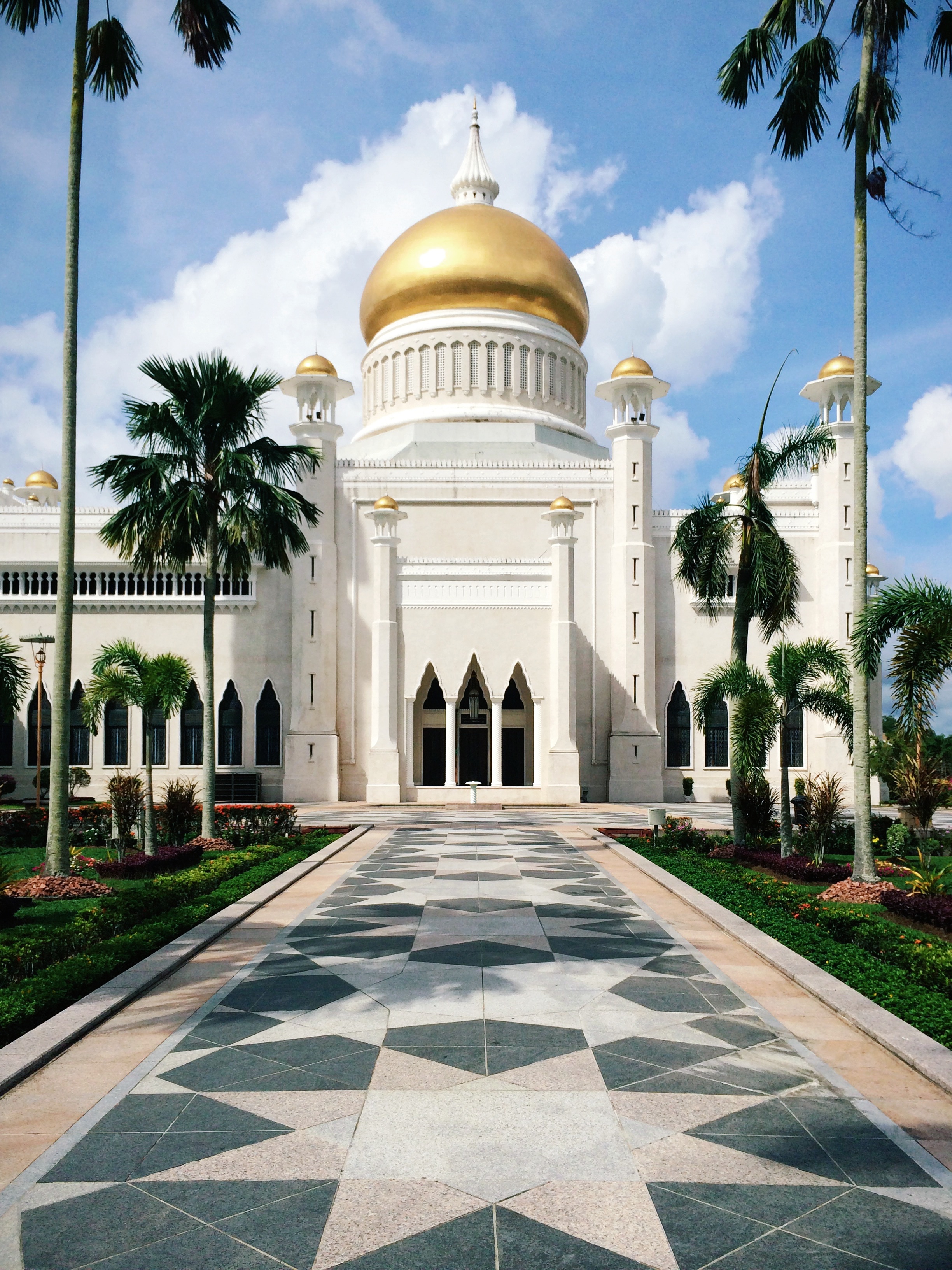 The sun gleams off the pure gold dome on a note spring day at the Sultan Omar Ali Saifuddien Mosque in Bandar Seri Begawan, Brunei.