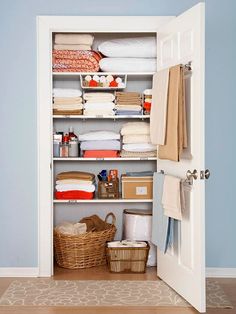 Use a towel rod on the inside of the linen closet for holding blankets. (this is a good idea for back of guest room door too so if guests need extra blankets, they are easy to find)