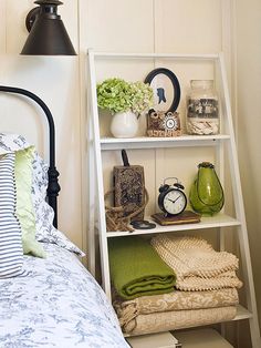 Ladder-Style Shelving - cute, trendy and does not take up a lot of space, also can be painted to fit any décor!