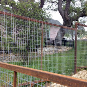 Tall mesh or wire fences can keep deer out of your yard while not obstructing your view. (Photo by Jason Hargraves)