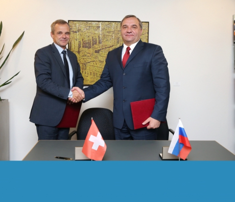 Russian Emergency Minister Vladimir Puchkov sings joint communiques on cooperation with Director of Swiss Federal Office for Civil Protection Benno Bühlmann 