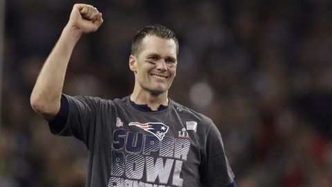 New England Patriots' Tom Brady raises his fist after his team defeated the Atlanta Falcons in overtime at the NFL Super Bowl 51 football game Sunday, Feb. 5, 2017, in Houston. The Patriots defeated the Falcons 34-28. (AP Photo/Darron Cummings)