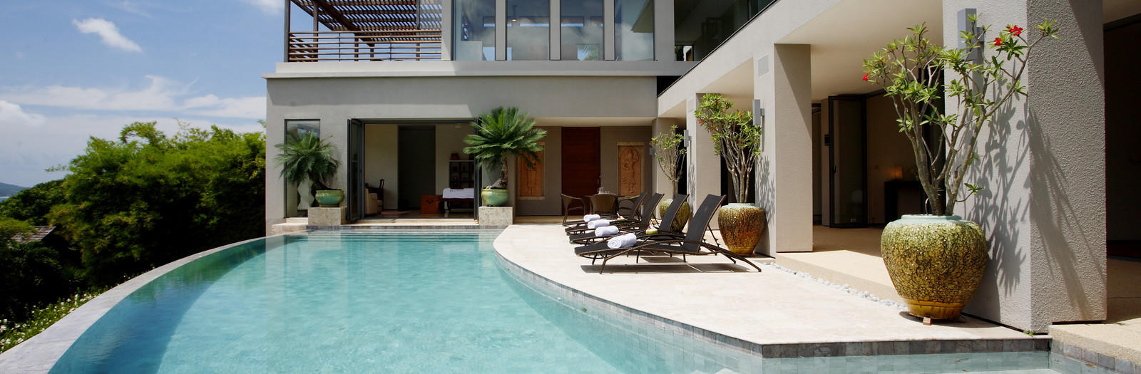 Asian Pool with second story deck with pergola