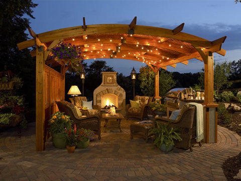 Traditional Patio with fire place and kitchen area under trellis