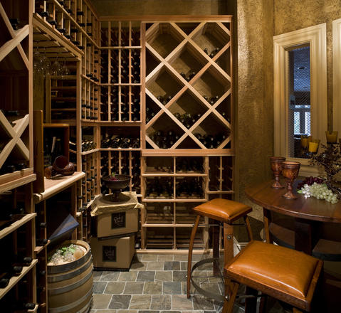 Traditional Wine Cellar with leather cushion barstools