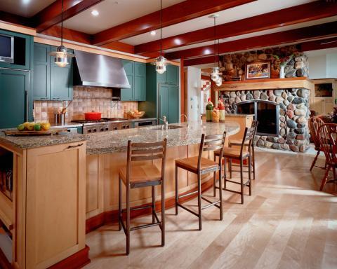 Traditional Kitchen with river rock fire place surround