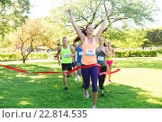 happy young female runner winning on race finish, фото № 22814535, снято 16 августа 2015 г. (c) Syda Productions / Фотобанк Лори