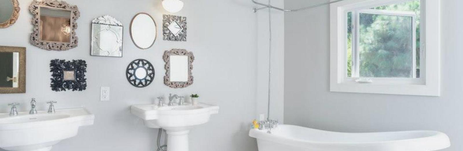 Eclectic Bathroom with white and black tiled floor