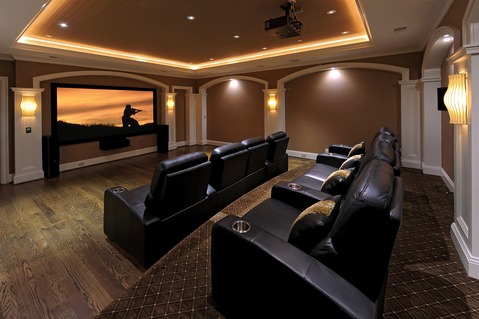 Transitional Home Theater with black leather theater seat