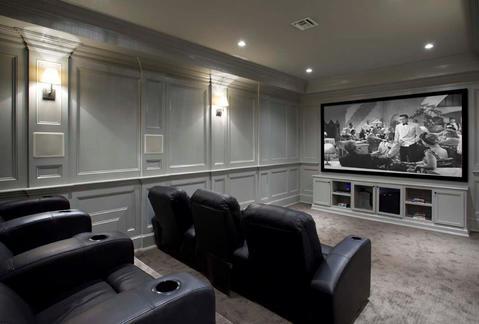 Transitional Home Theater with black leather theater seating