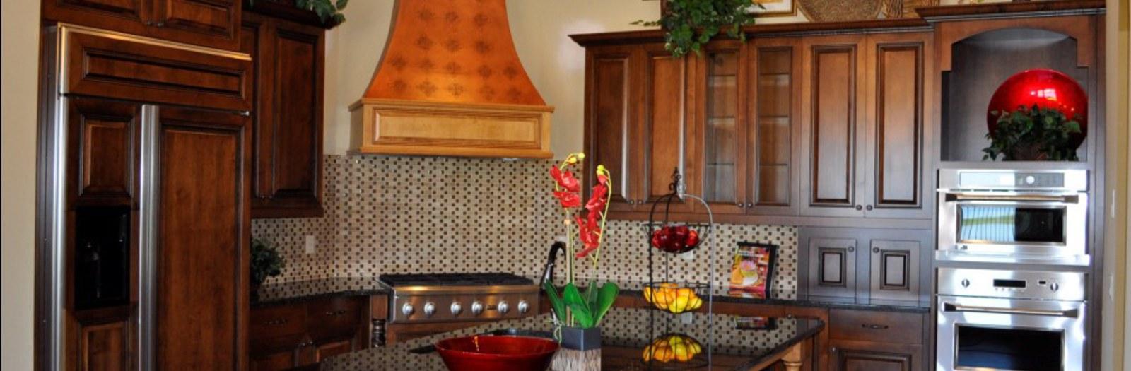 Transitional Kitchen with brown and tan mosaic backsplash