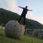 Wikimedian jumping from Wikipedia monument in Dilijan, Armenia