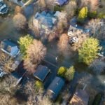 Luxury homes flooded as the river swells into historic neighborhood