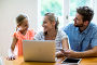 Купить «Smiling parents with technologies looking at daughter», фото № 22525508, снято 26 января 2016 г. (c) Wavebreak Media / Фотобанк Лори