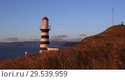 Купить «Petropavlovsk Lighthouse on Pacific Coast of Kamchatka Peninsula», видеоролик № 29539959, снято 15 октября 2018 г. (c) А. А. Пирагис / Фотобанк Лори