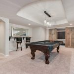 Finished basement remodel with pool table