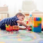 child playing in playroom