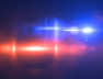 Beautiful light flares. Glowing streaks on dark background. Police light flares