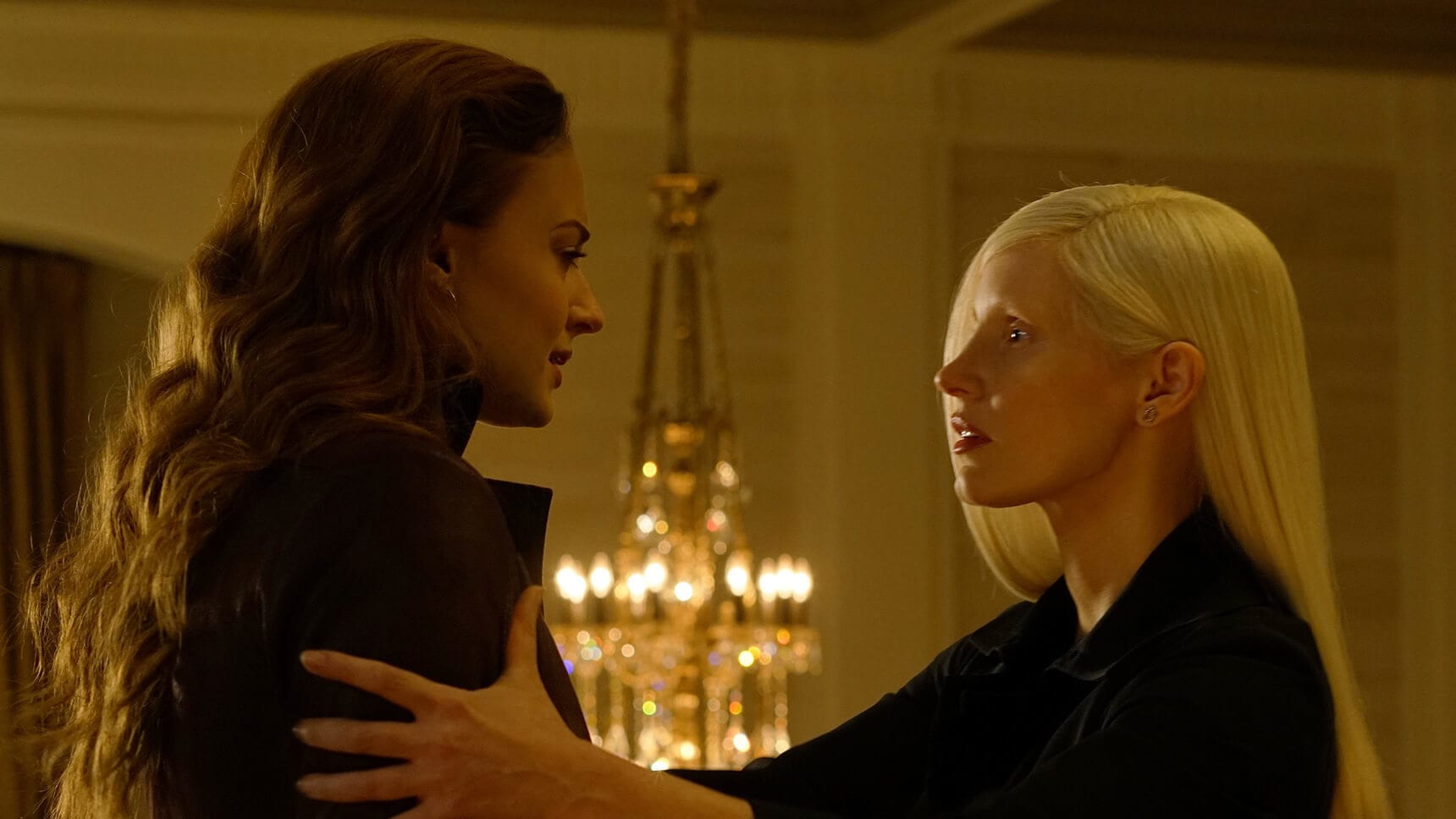 Actor Sophie Turner (as Jean Grey/Phoenix), and Jessica Chastain (as Vuk) in the movie "X-Men: Dark Phoenix"