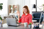 woman with laptop having video call at home office. Стоковое фото, фотограф Syda Productions / Фотобанк Лори