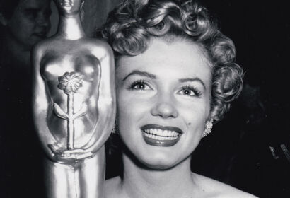 Marilyn Monore and her Henrietta Award as World Favorite, 1952