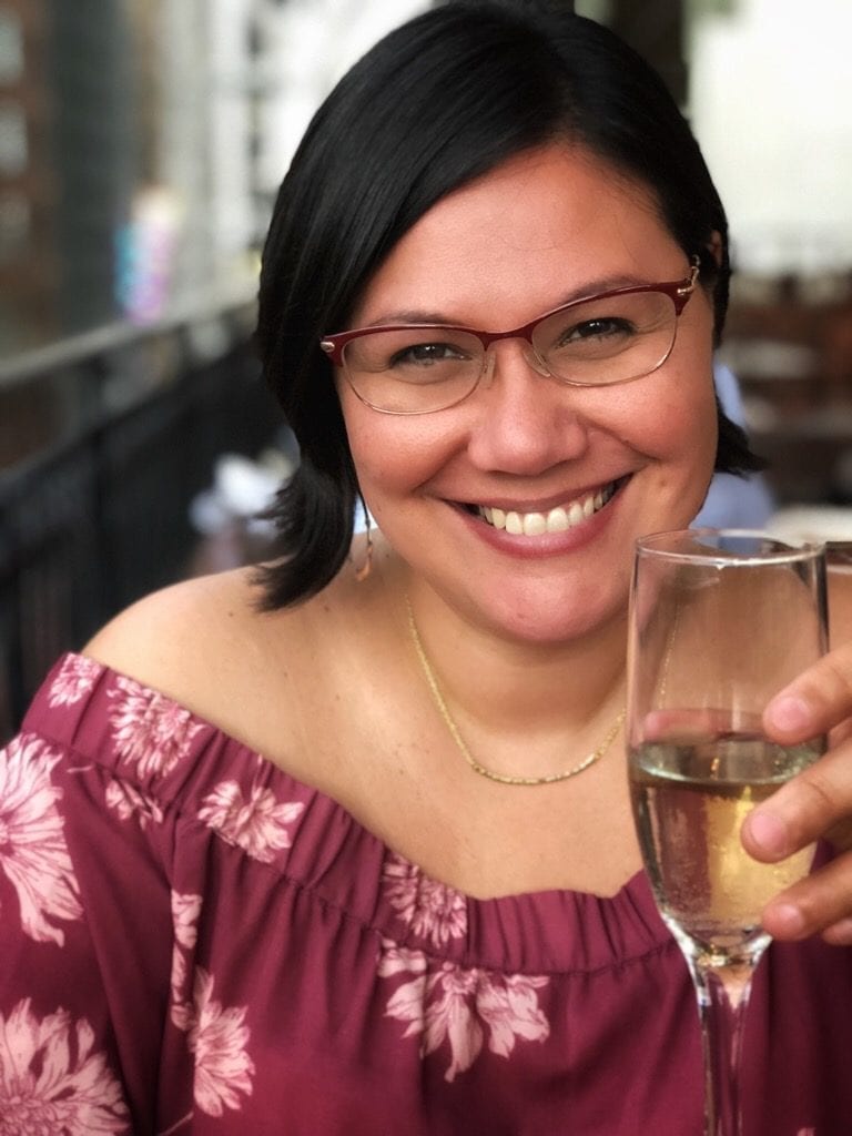 Sheryle Gillihan toasting a wine glass