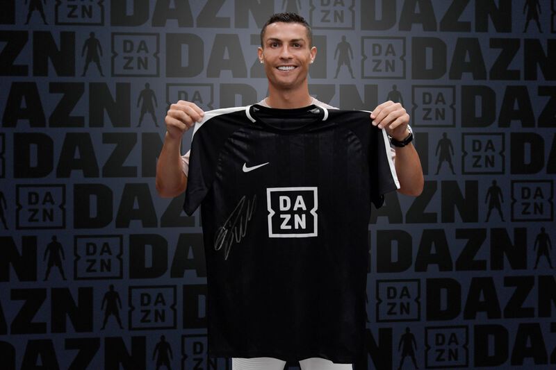 DAZN: Holding a jersey