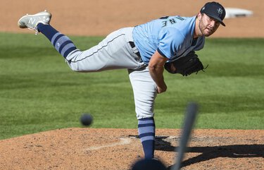 Sam Delaplane throws to Austin Shenton in the 8th.   The Seattle Mariners played an intrasquad game at T-Mobile Park Monday, July 13, 2020. 214450