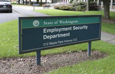 This photo shows a sign at the headquarters for Washington state’s Employment Security Department Tuesday, May 26, 2020, at the Capitol in Olympia, Wash. Washington state’s rush to get unemployment benefits to residents who lost jobs due to the coronavirus outbreak left it vulnerable to criminals who made off with hundreds of millions of dollars in fraudulent claims. (AP Photo/Ted S. Warren) WATW102