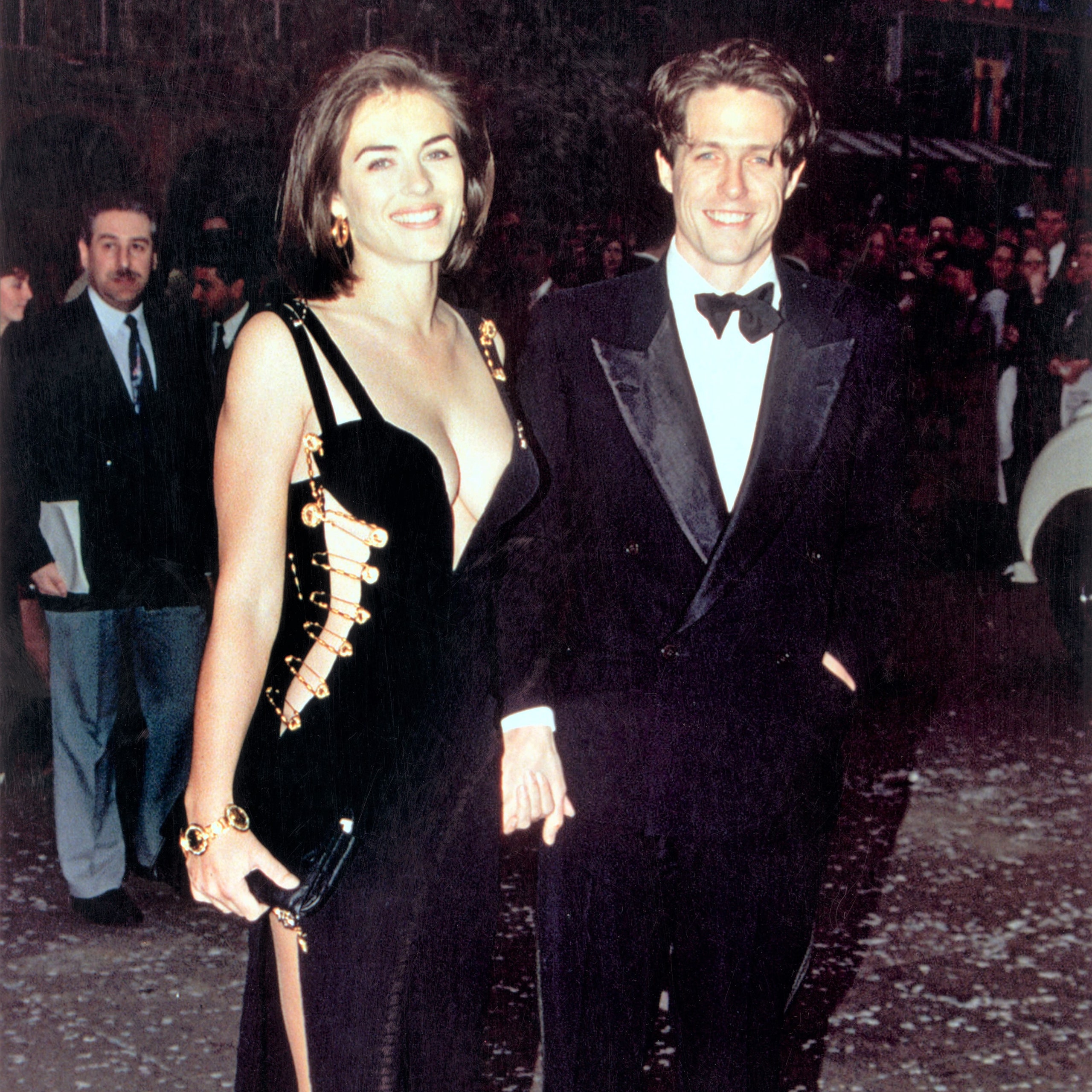 Hugh Grant and Elizabeth Hurley both in Versace at the premiere of Four Weddings and a Funeral 1994.