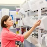 woman shopping for the best air conditioner