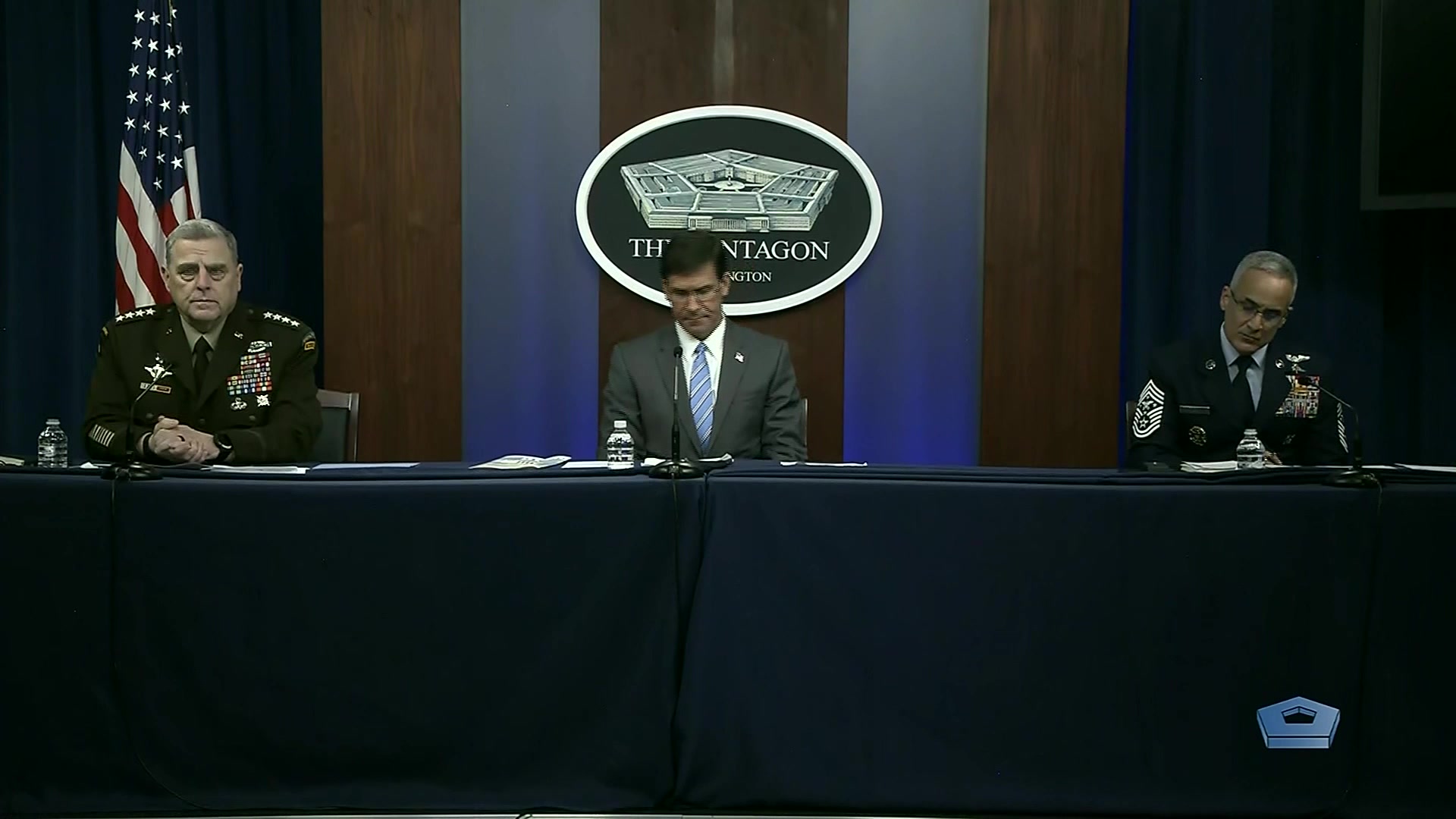 Defense Secretary Dr. Mark T. Esper, Joint Chiefs Chairman Army Gen. Mark A. Milley and Senior Enlisted Advisor to the Chairman Ramón “CZ” Colón-López sit at a table.