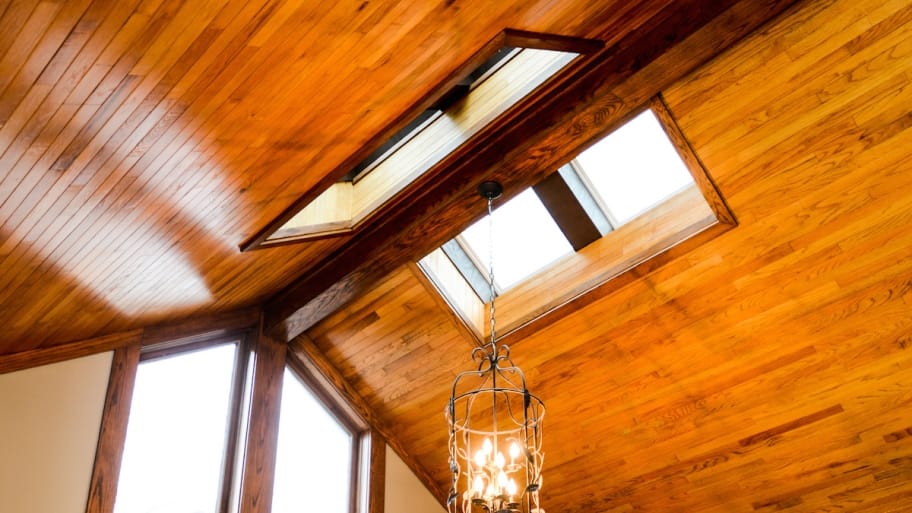 skylights in wood-covered ceiling