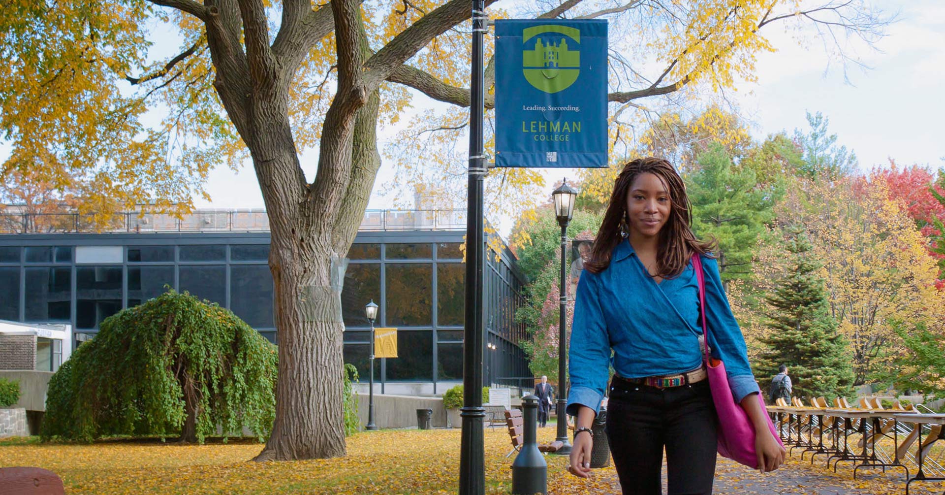 Female student walking on the Lehman college campus