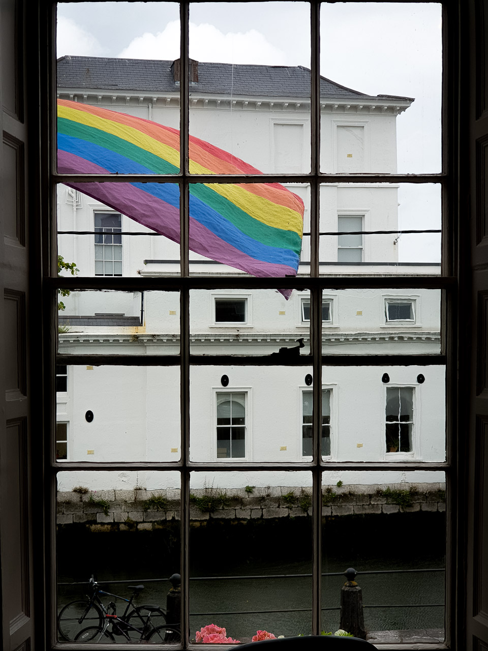 The Rainbow Flag flies from the Quay CO-OP