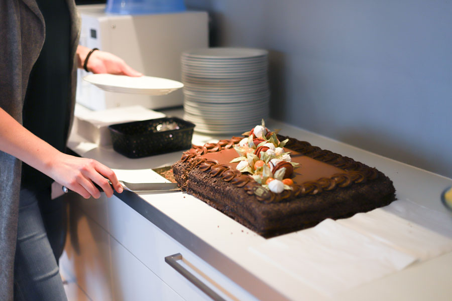 Woman cutting a cake