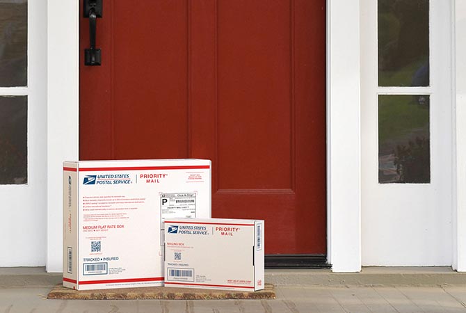 Packages on doorstep awaiting pickup.