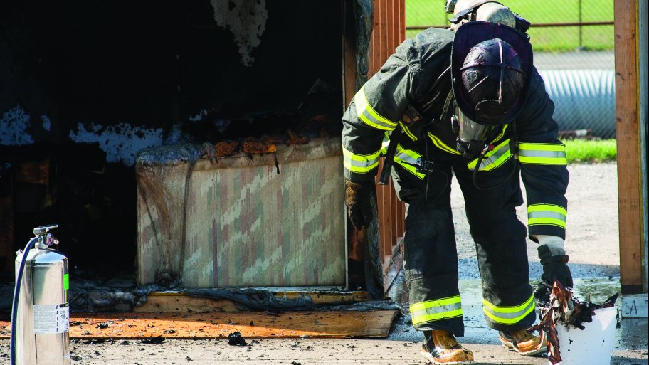 firefighter after fire in home