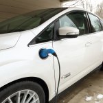 an electric car plugged into a charging station