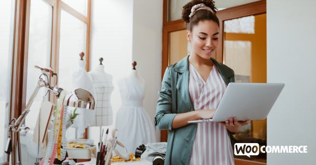 store owner looking at orders in a fashion shop