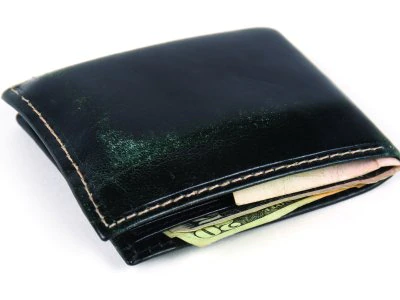 wallet with money sticking out