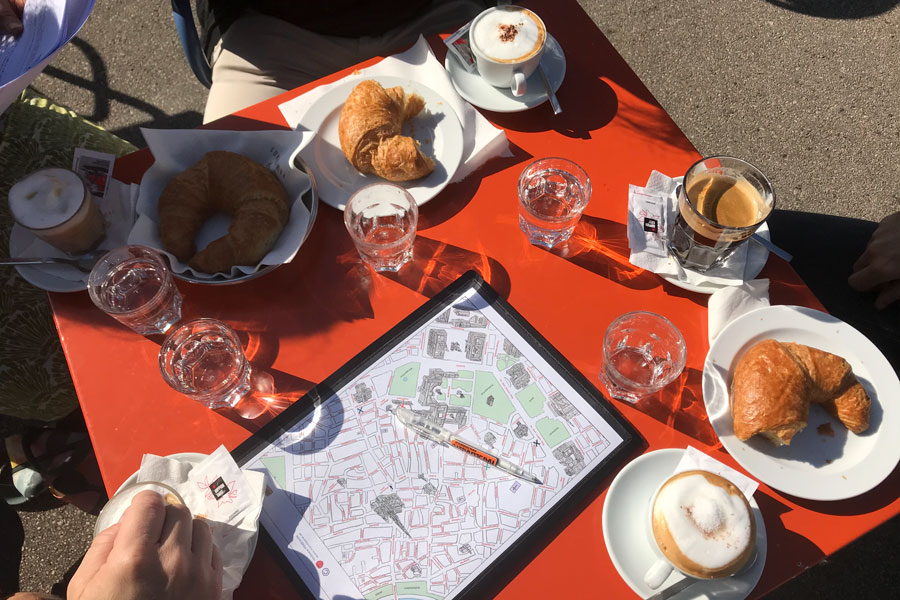 A table with a map and food