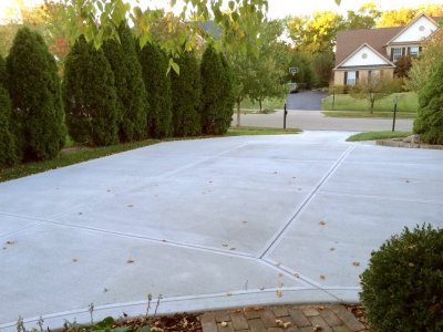 newly poured concrete driveway