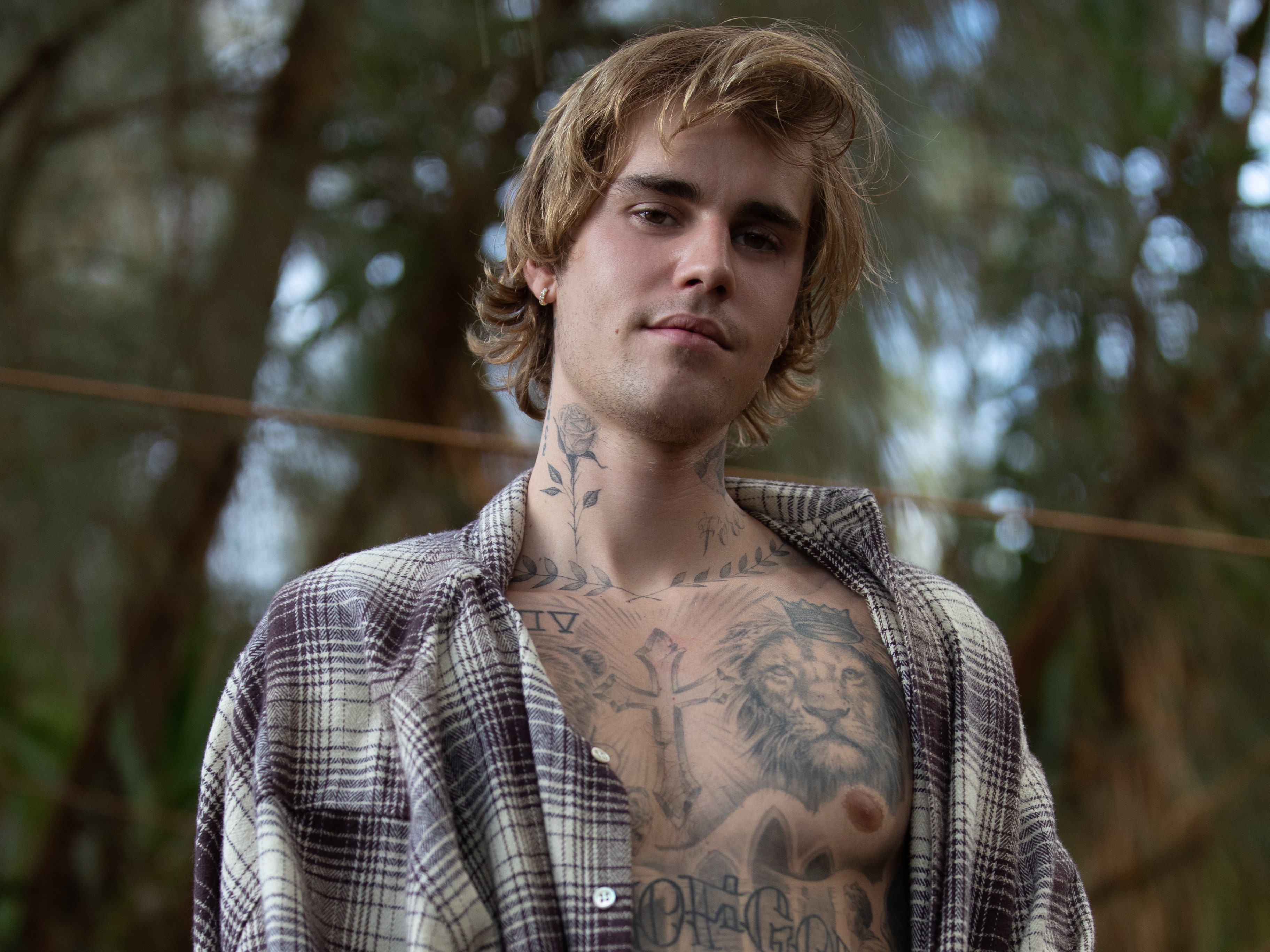 Image may contain Skin Justin Bieber Human Person and Tattoo