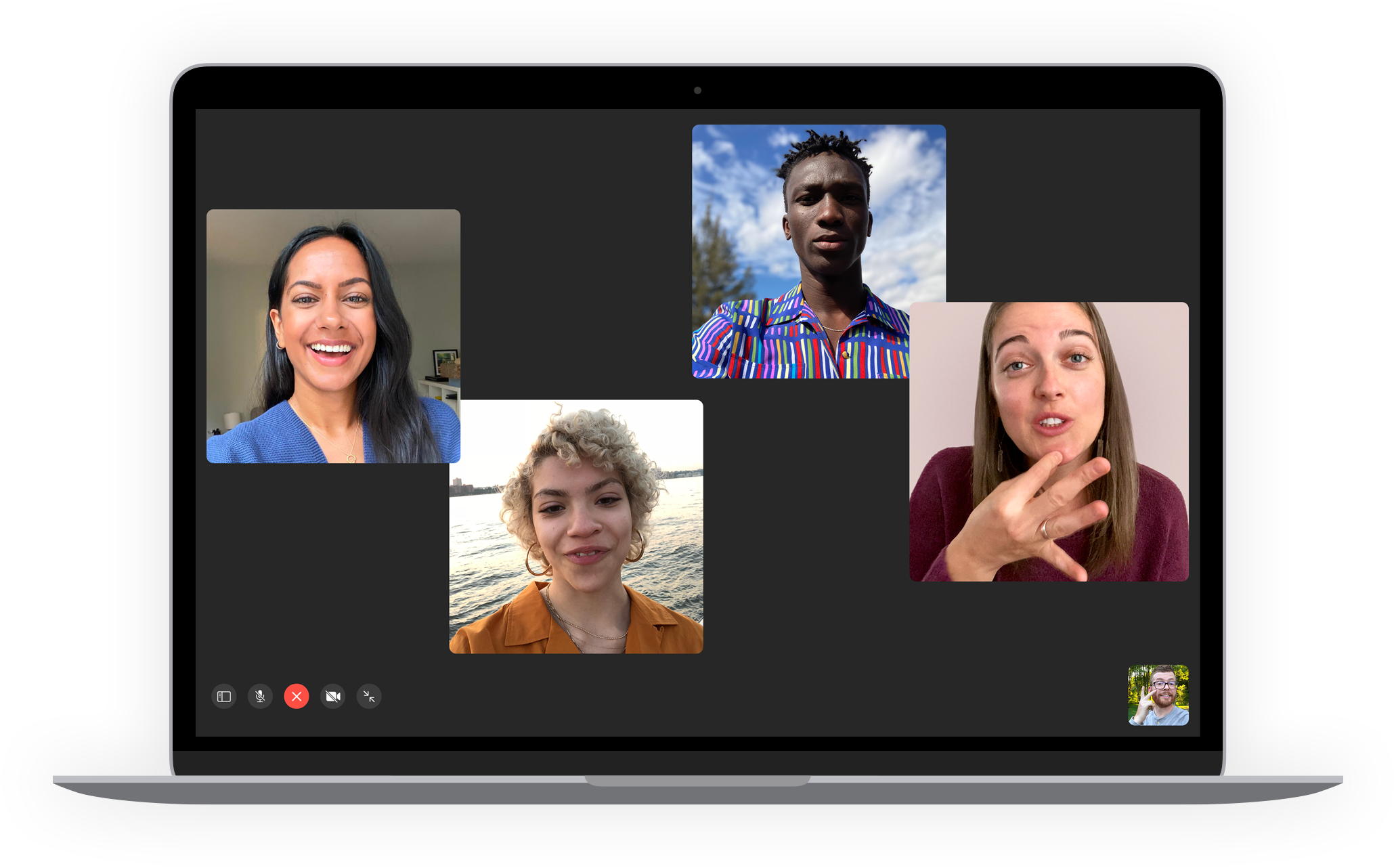 FaceTime call on MacBook with some participants using sign language.