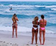 Spring break tourists from New Jersey enjoy the beach in Miami March 19, 2020.